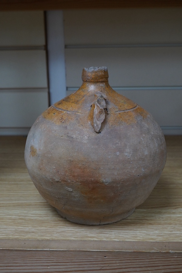 A Verwood pottery owl costrel, with twin handles, 21cm high. Condition - cracked